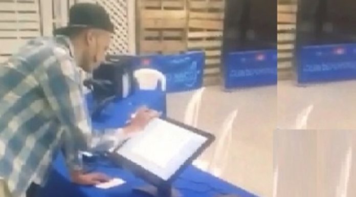 Fulcar muestra vídeo de individuo manipulando computadora de JCE