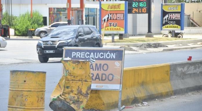 Comunitarios rechazan el muro que divide la Autopista San Isidro